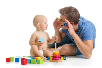 child  boy and father playing together